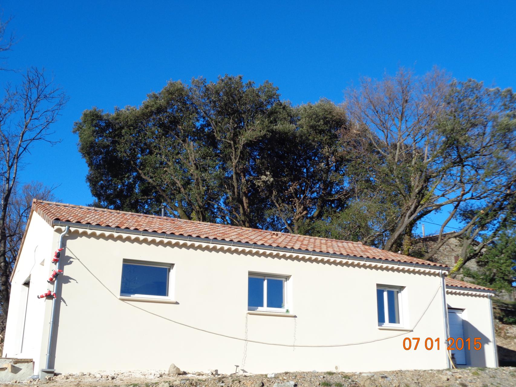 Menuiseries blanches, enduit finition Gratté fin