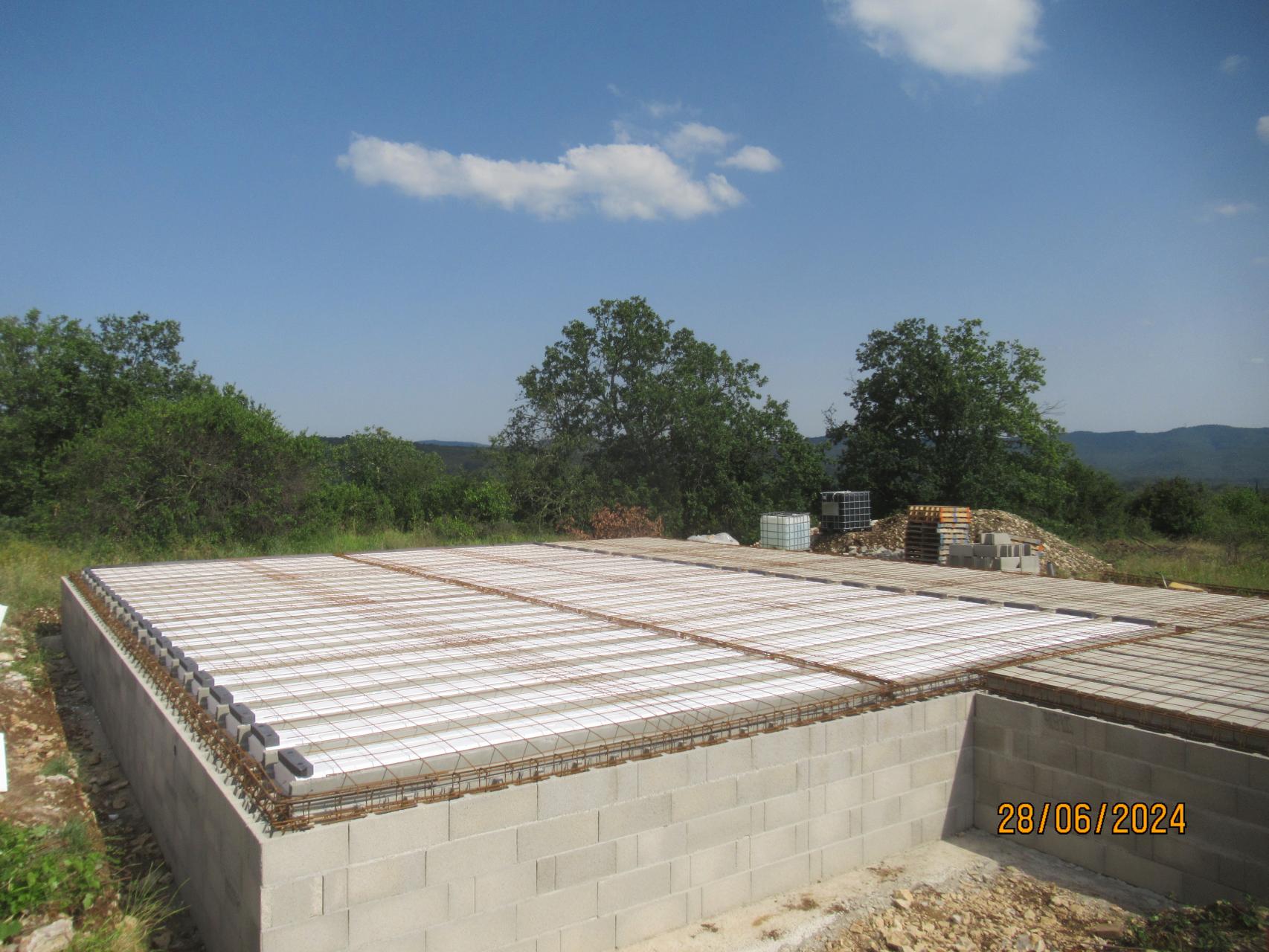 Pose des poutrelles et hourdis du plancher