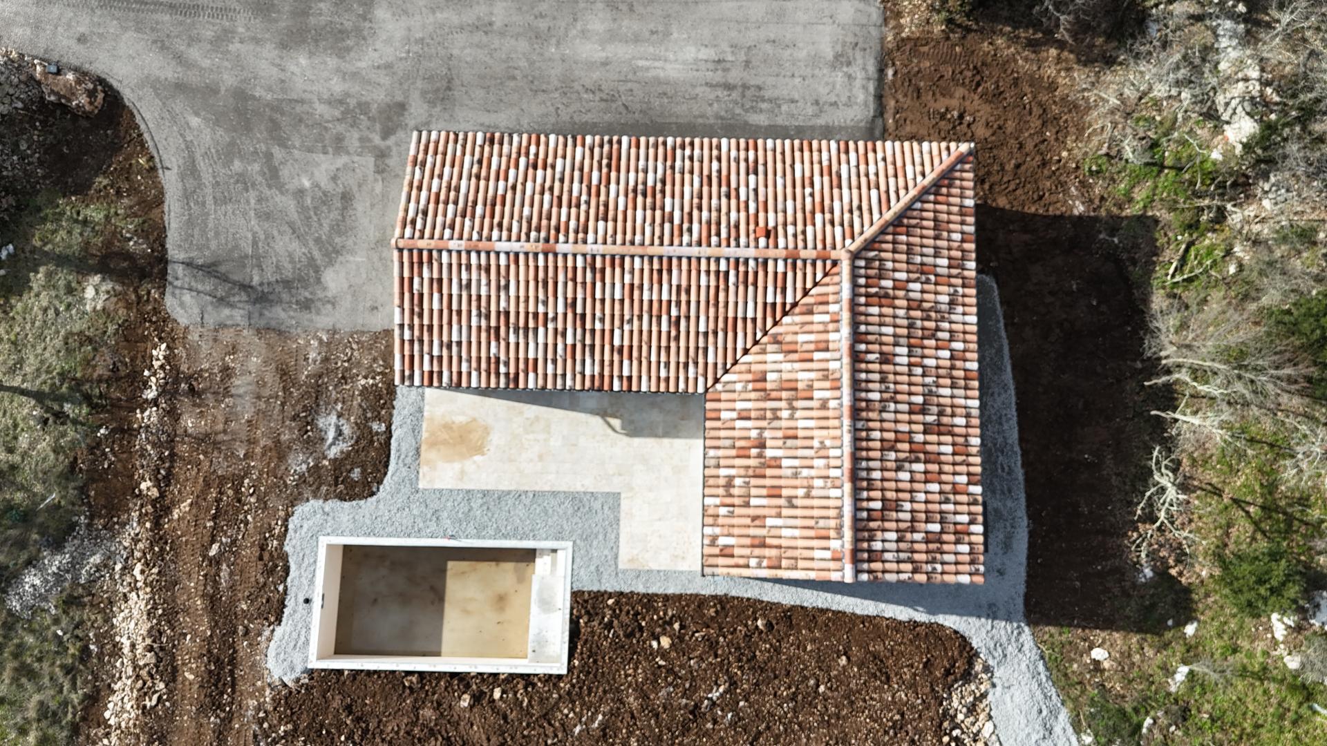 Menuiseries grises anthracite, enduit finition Gratté fin